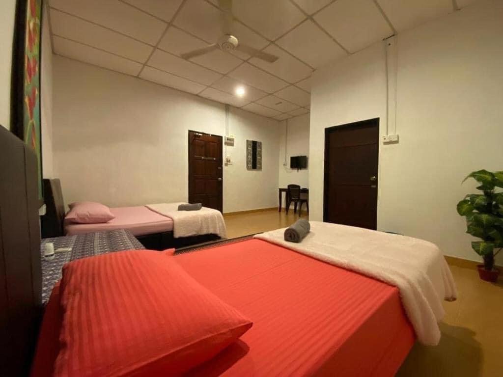 Kencana Guest House Pantai Cenang  Kültér fotó